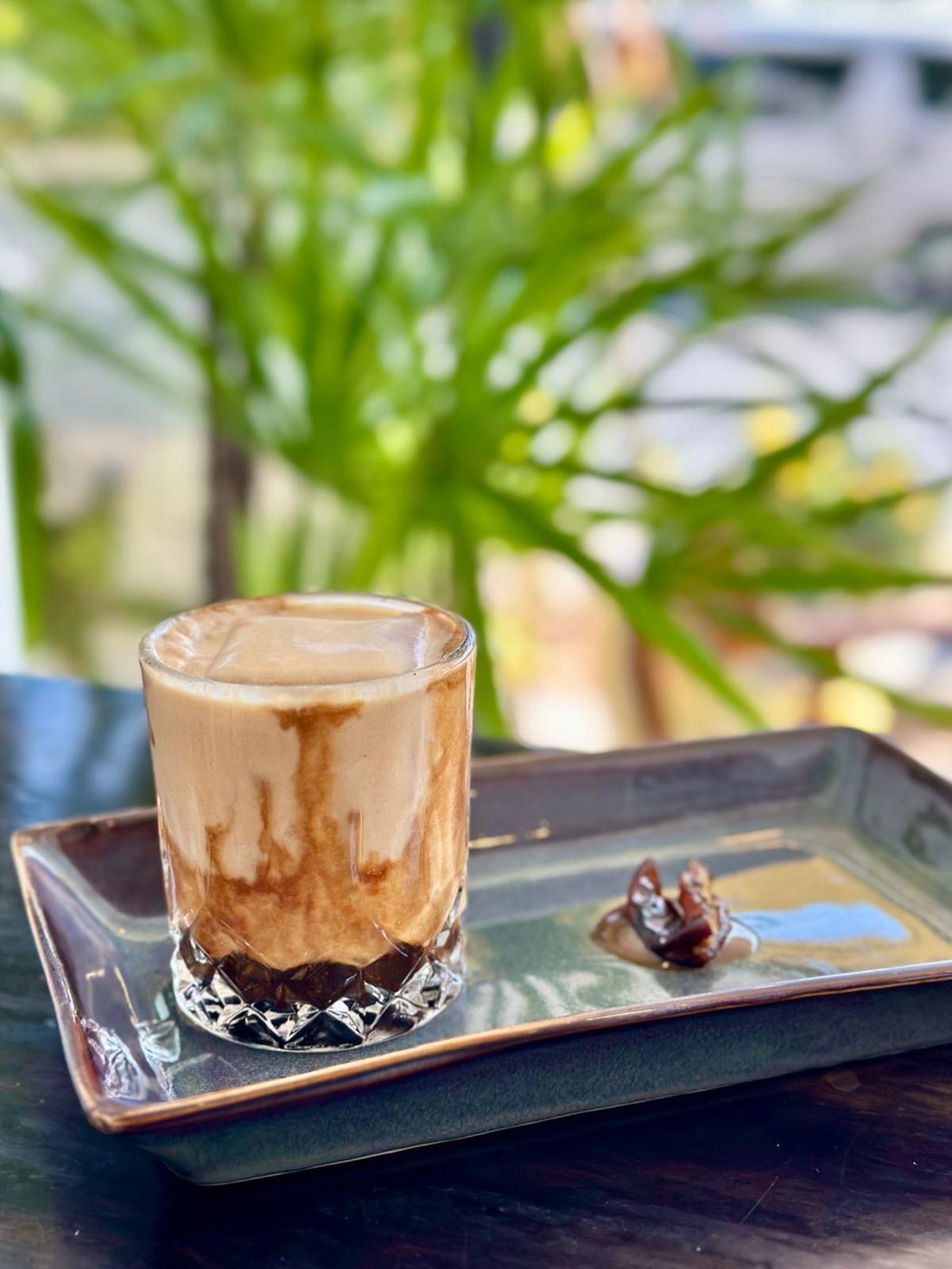 Sticky Date Latte, iced latte with homemade date milk and caramel, at Izzy's Specialty Coffee, Bo Put, Ko Samui